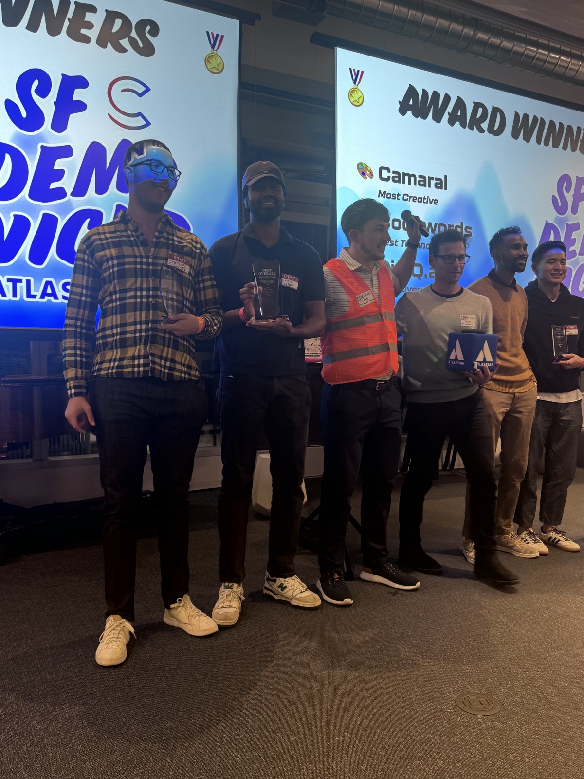 Rajaseelan accepting the Best Overall trophy at SF Demo Night for SigIQ.ai, 2025
